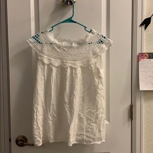 White ruffle blouse